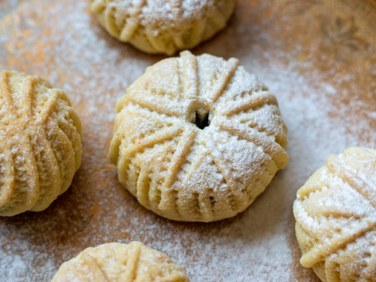 Traditional Middle Eastern date-filled cookies maamoul dusted with sugar