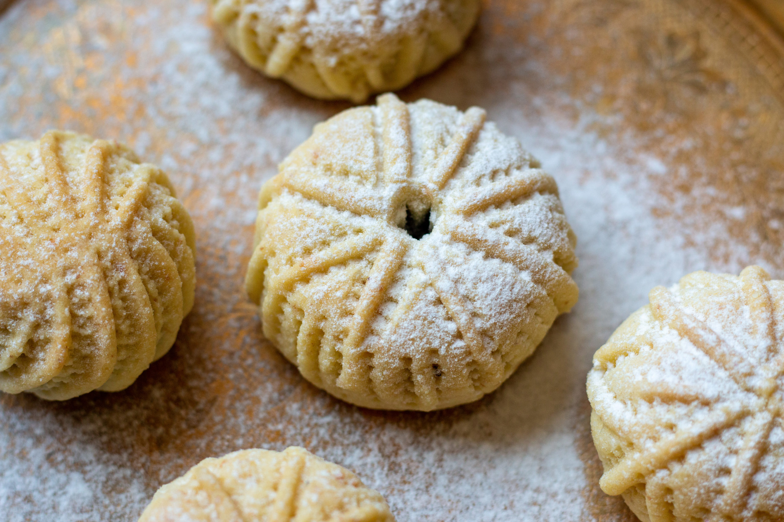Traditional Middle Eastern date-filled cookies maamoul dusted with sugar