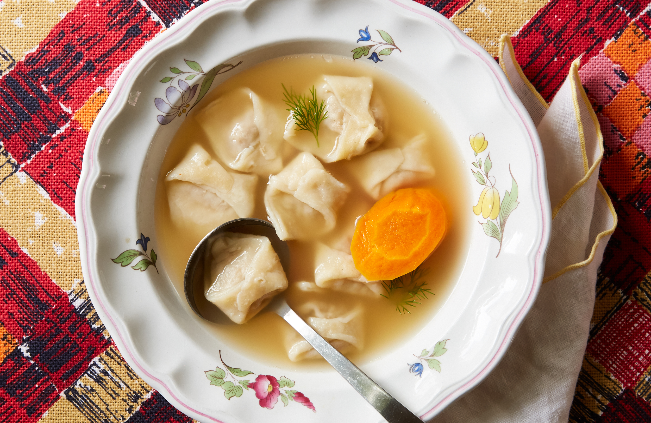 Bowl of chicken soup with kreplach, or meat-filled dumplings.