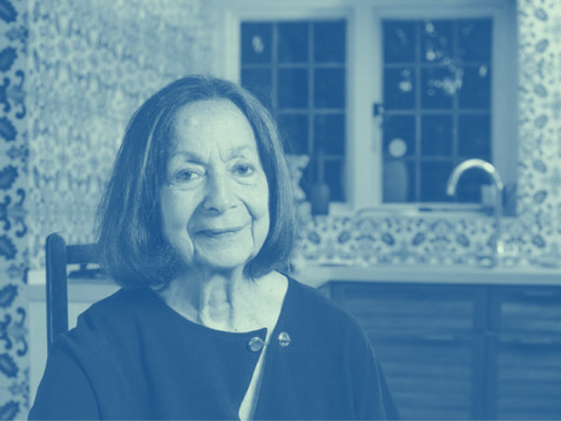 Author Claudia Roden sitting in her kitchen