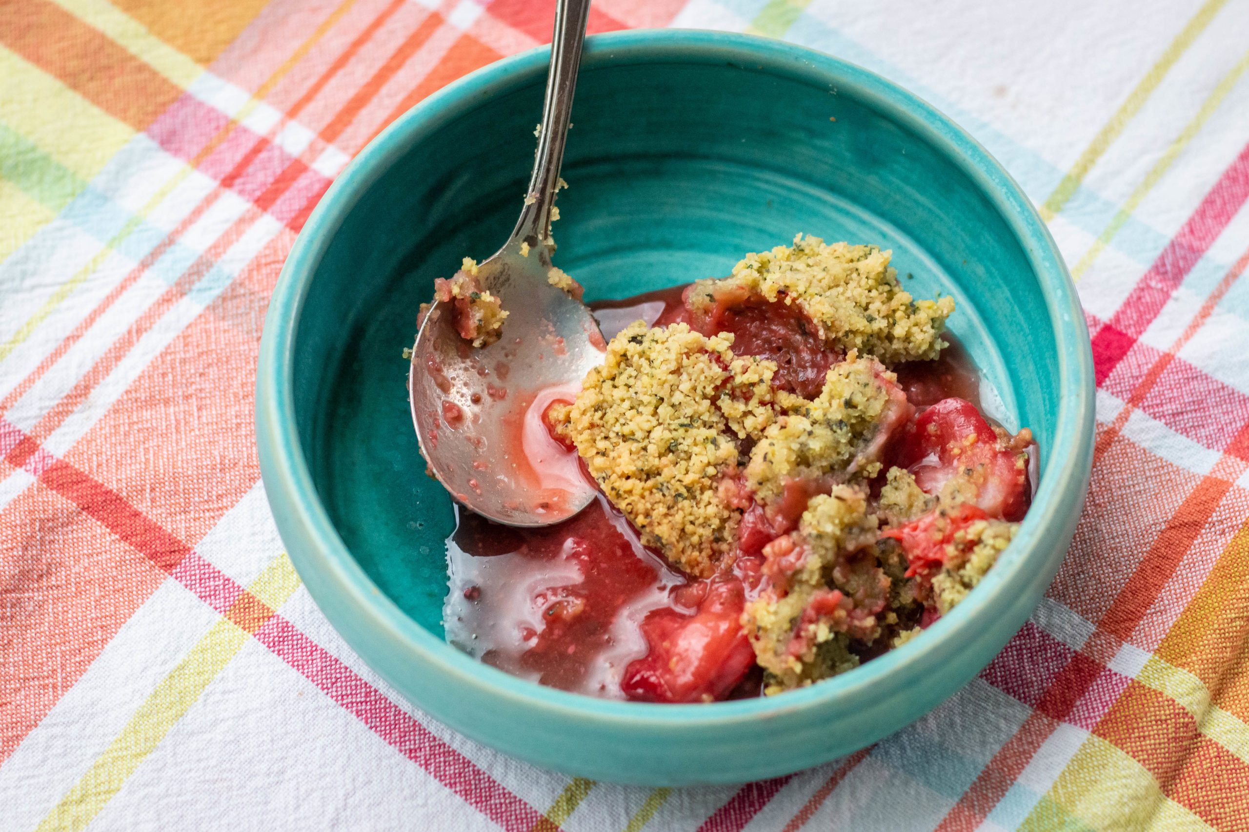 Turquoise bowl with strawberry and za'atar crumble
