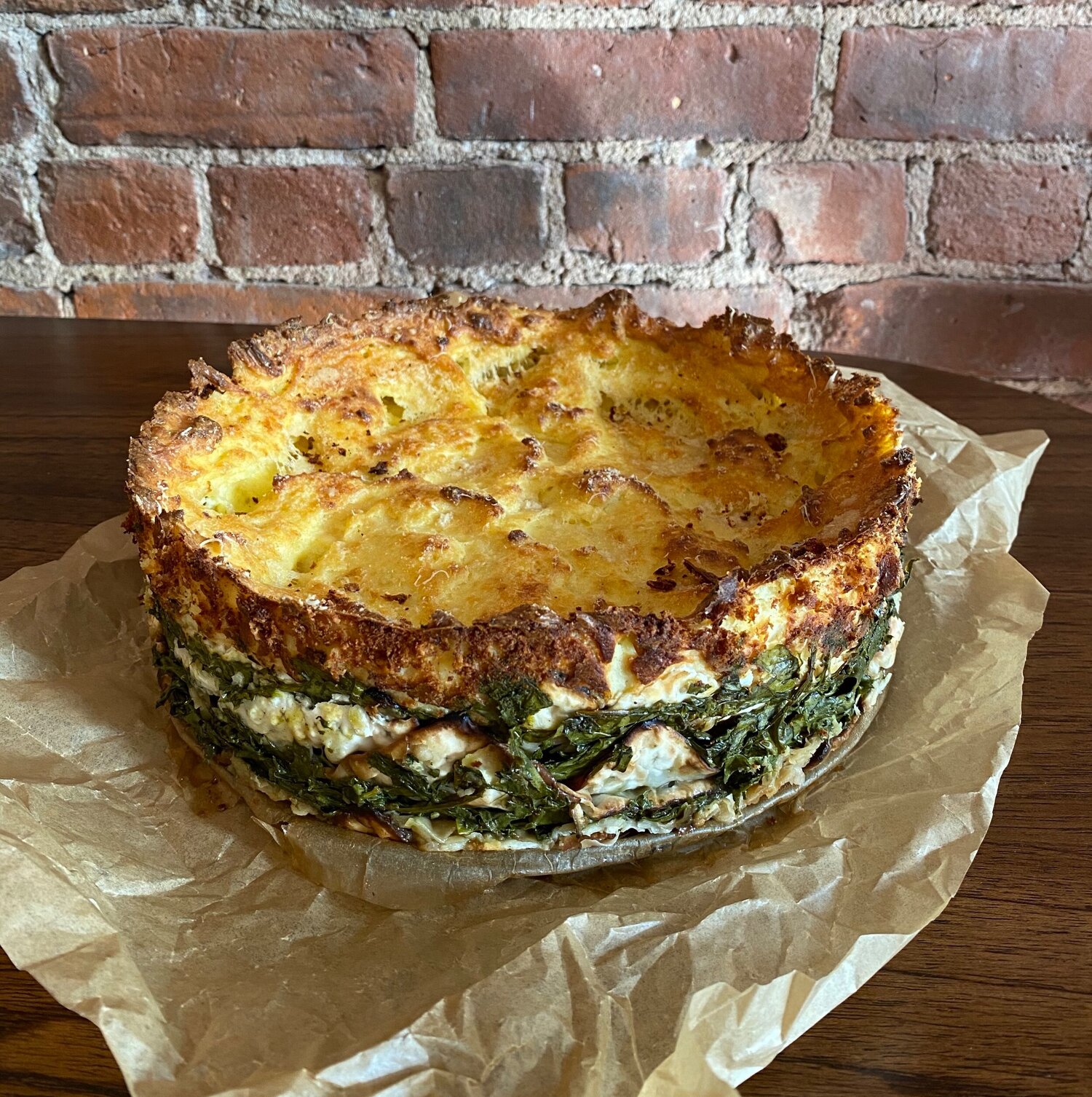 Sephardic mina with layers of potato, spinach, and cheese