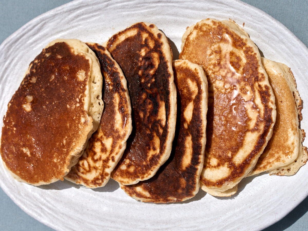 Pancakes on white oval-shaped plater