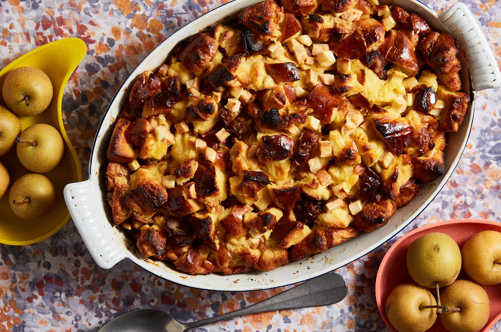Apple and challah bread pudding in oval baking dish