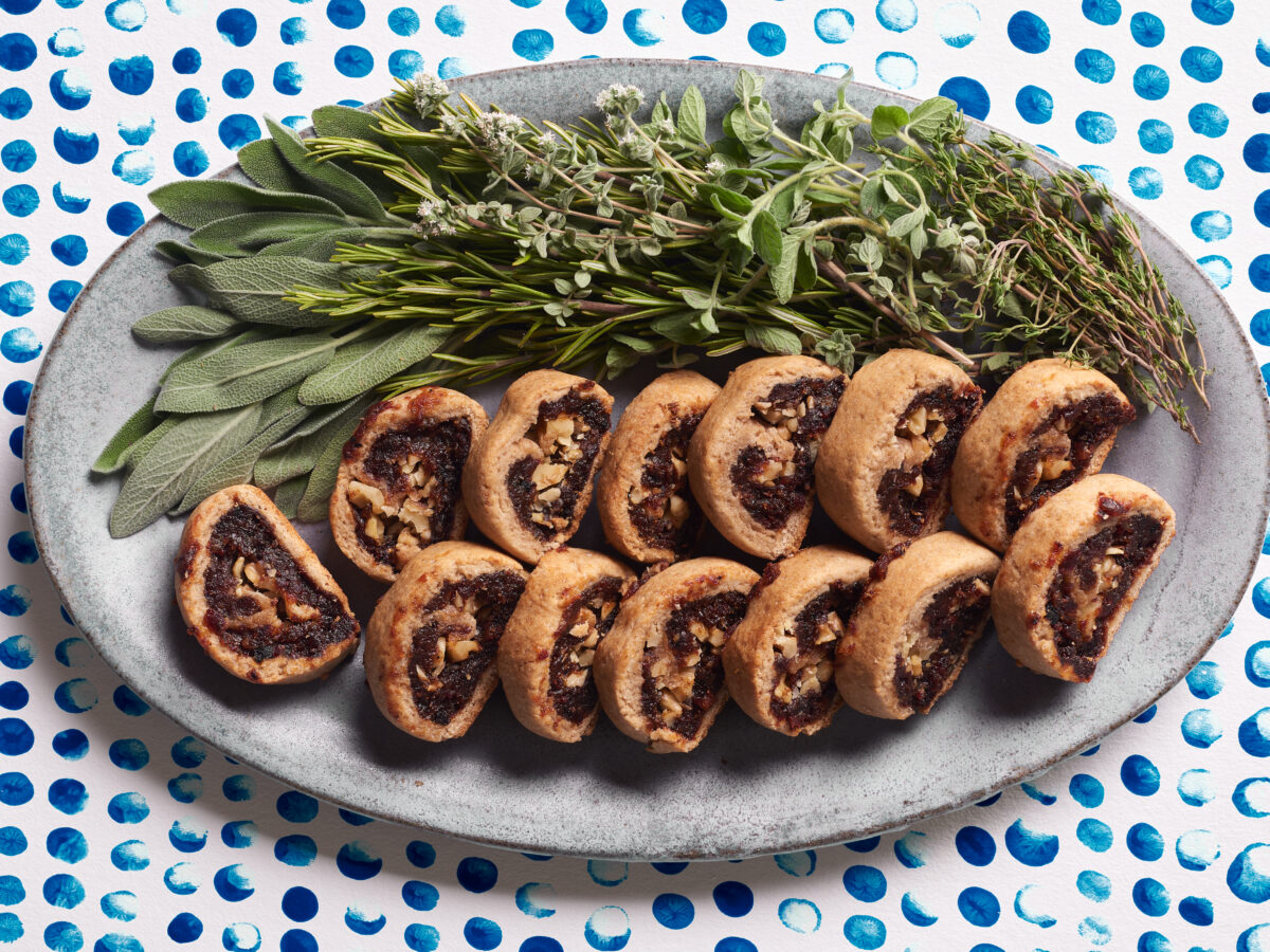 Fig cookies on oval platter wtih herbs